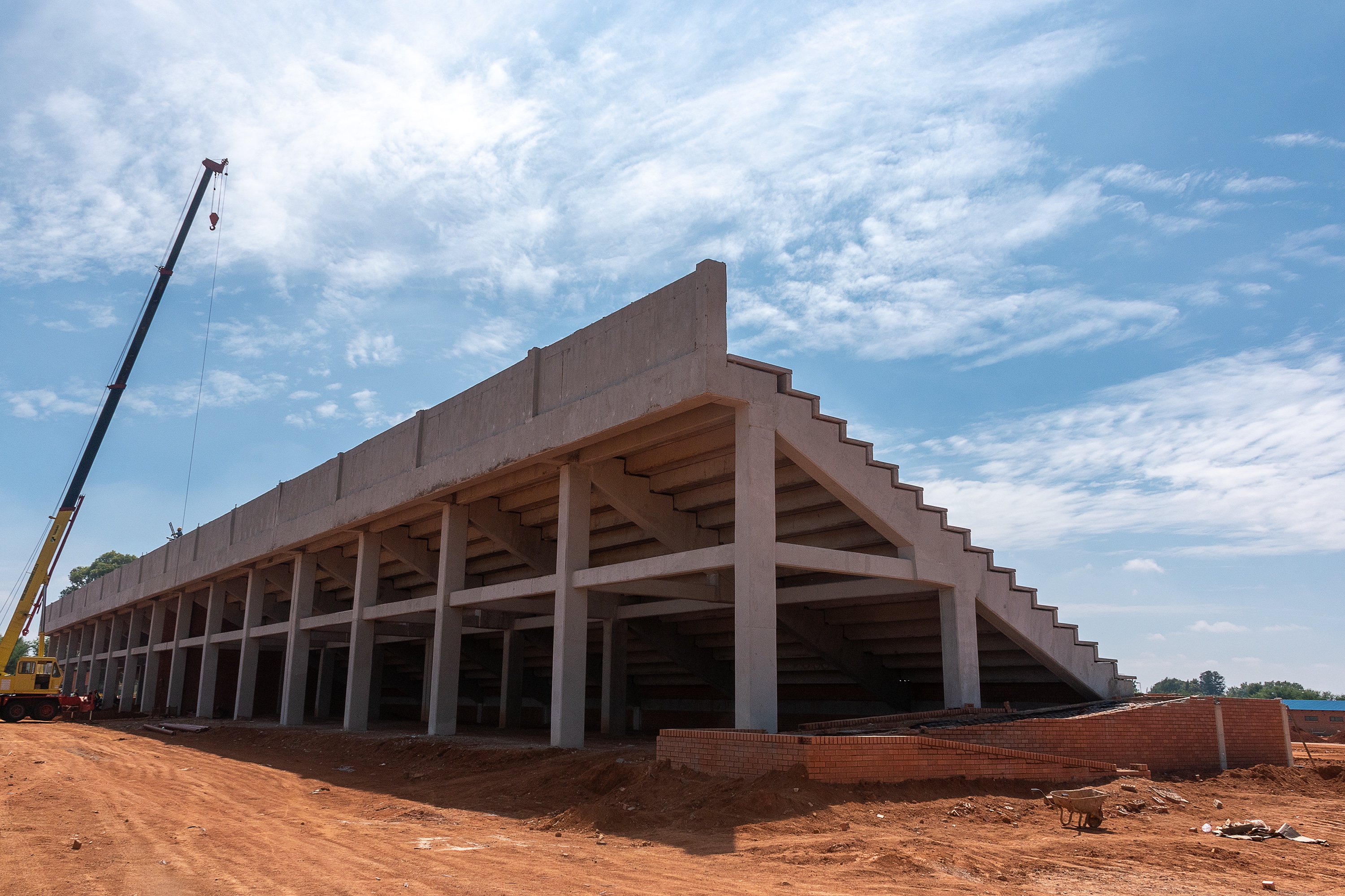 Large concrete grandstand structure under construction by Staruts Construction
